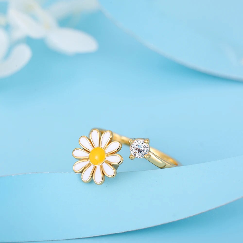 anillo antiestres daisy fondo azul vista lateral